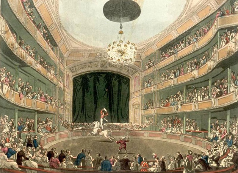 a painting of a large theater, at the center is a circular ring where a performer is standing on a horse